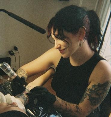Tattoo artist at work